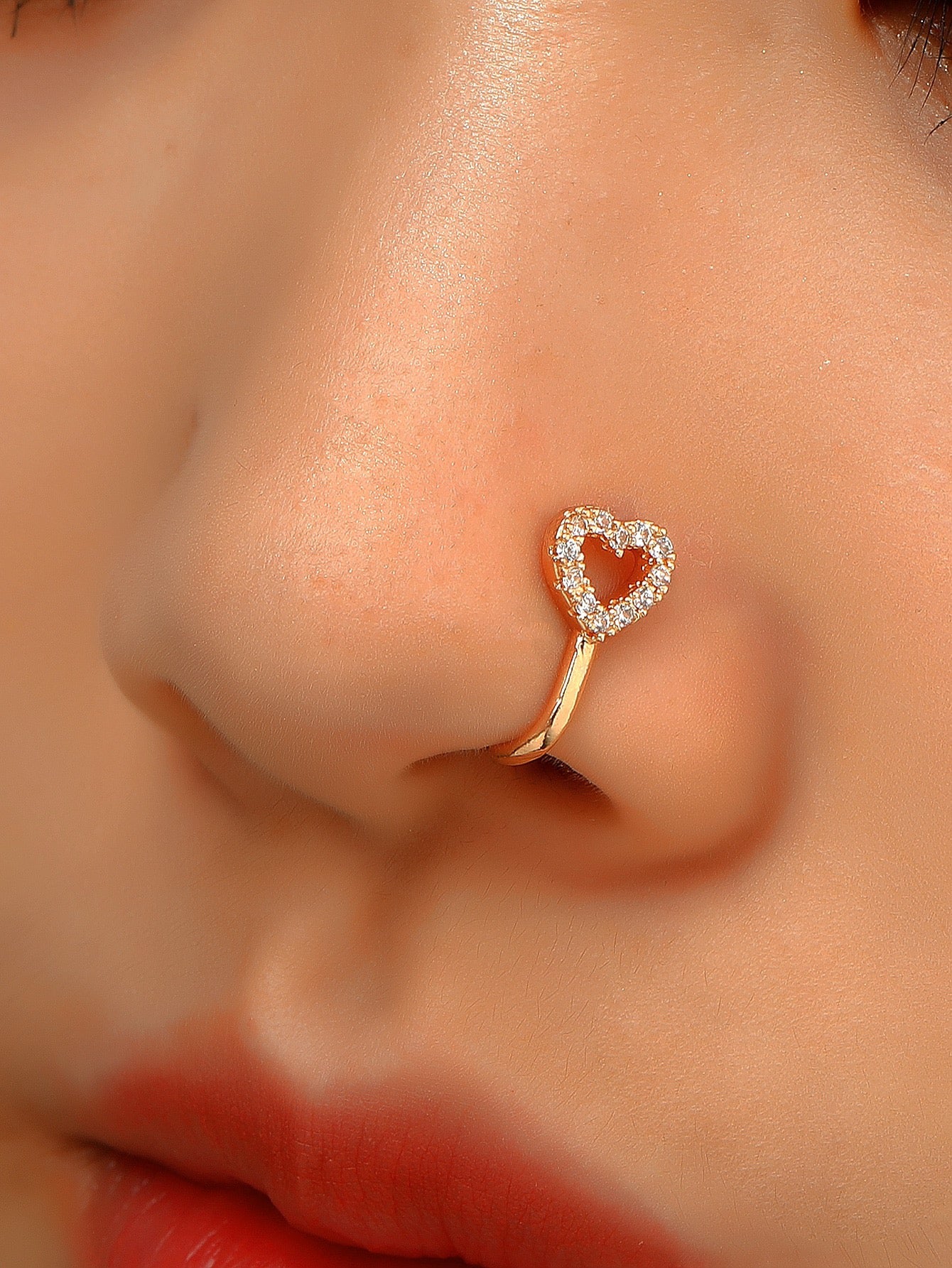 Faux love nose piercing
